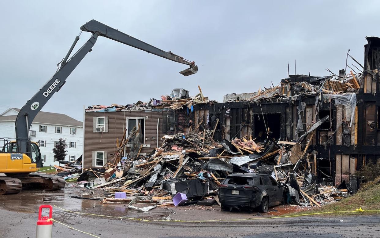 The site of the apartment building has been turned over to insurance adjusters. (Jackie Sharkey/CBC - image credit)