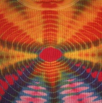 Close-up of a tie-dye pattern with concentric circular designs