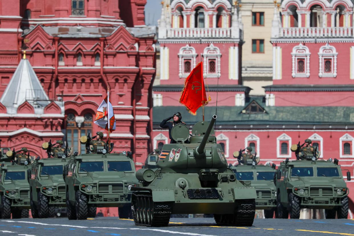Tanks roll in a military parade on Red Square in Moscow.