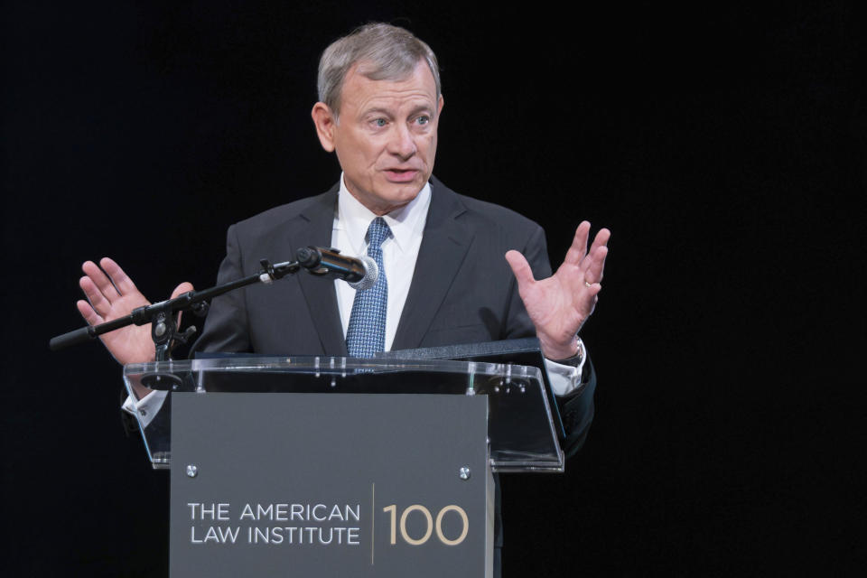 Chief Justice Roberts says Supreme Court is committed to ensuring ethical conduct (Jose Luis Magana / AP)