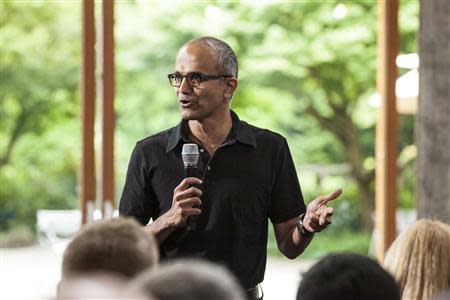 Satya Nadella, executive vice president, Cloud and Enterprise, addresses employees during the One Microsoft Town Hall event in Seattle, Washington in this July 11, 2013 photo made available to Reuters on January 30, 2014. REUTERS/Microsoft/Handout via Reuters