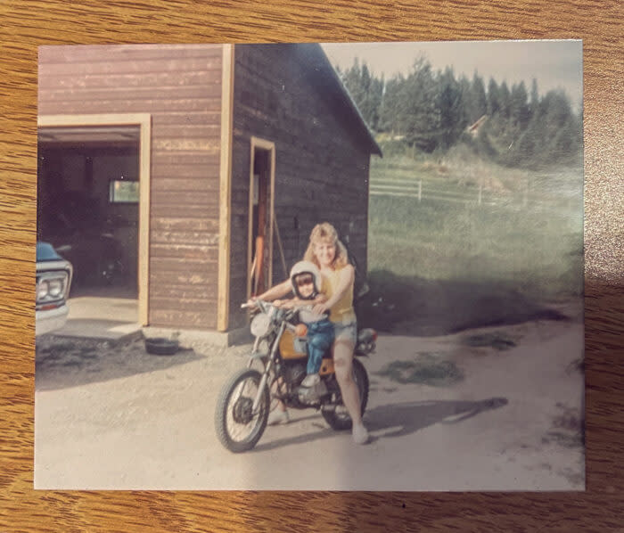 child and mother on vintage Yamaha Dirtbike