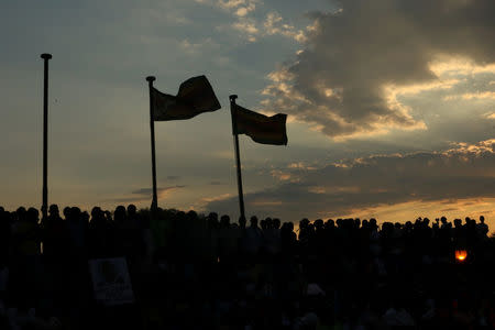 Supporters of Zimbabwe's former vice president Emmerson Mnangagwa await his arrival in Harare, Zimbabwe, November 22, 2017. REUTERS/Philimon Bulawayo