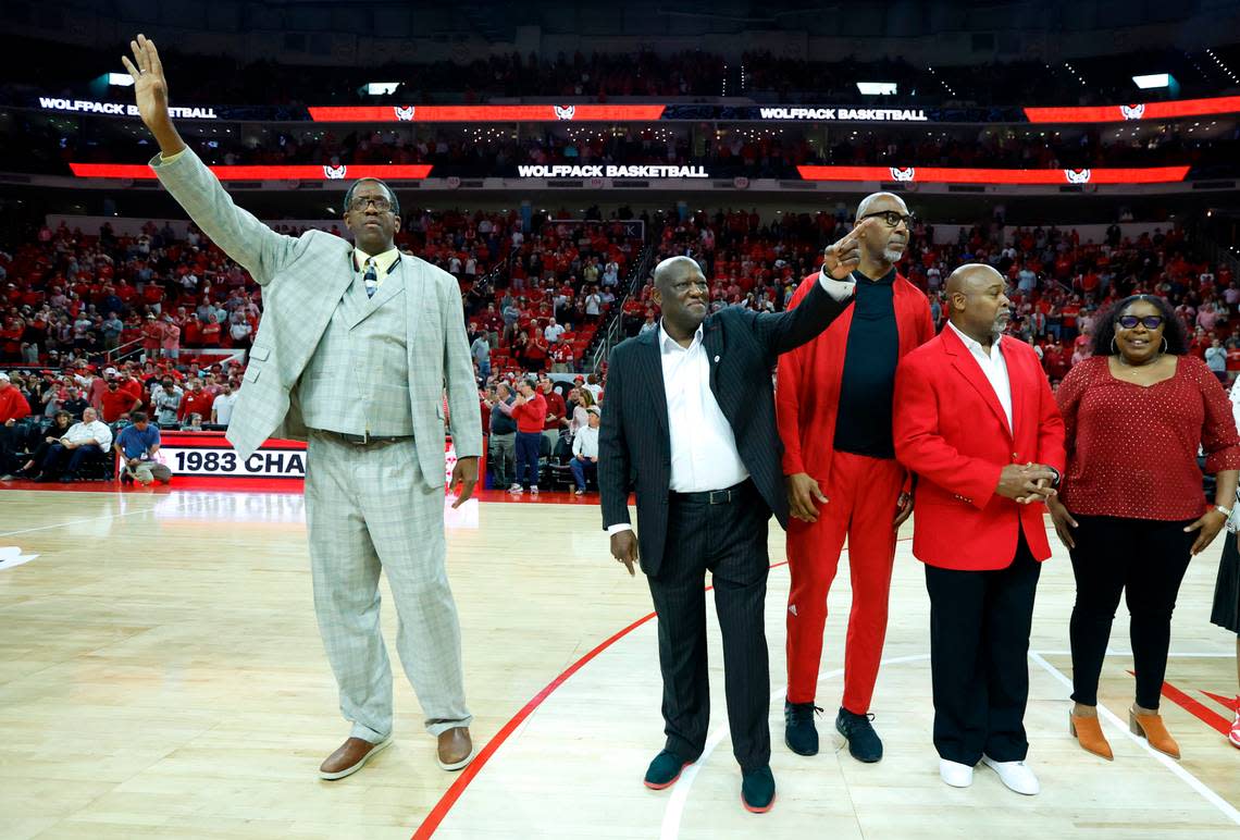 Members of the 1983 N.C. State national championship basketball team, including, from left, Cozell McQueen, Dereck Whittenburg, Thurl Bailey and Sidney Lowe are recognized during halftime of N.C. State’s game against Wake Forest at PNC Arena in Raleigh, N.C., Wednesday, Feb. 22, 2023.