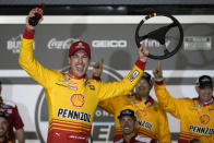 Joey Logano celebrates in Victory Lane after winning the first of two qualifying auto races for the NASCAR Daytona 500 at Daytona International Speedway, Thursday, Feb. 16, 2023, in Daytona Beach, Fla. (AP Photo/John Raoux)