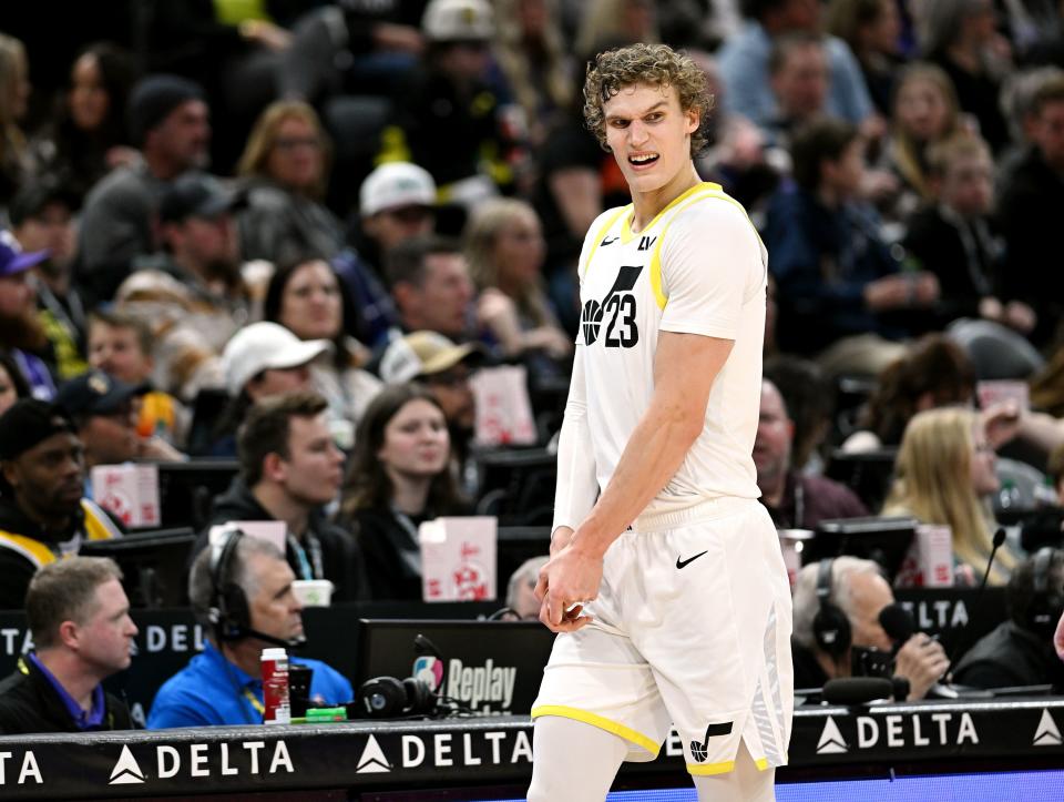 Utah Jazz forward Lauri Markkanen (23) holds his right hand after receiving an injury as the Utah Jazz and Los Angeles Lakers play at the Delta Center in Salt Lake City on Saturday, Jan. 13, 2024. Utah won 132-125. | Scott G Winterton, Deseret News