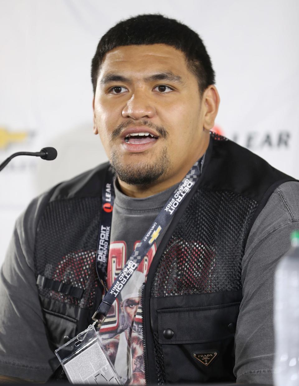 Detroit Lions tackle Penei Sewell talks with reporters before the Detroit Grand Prix NTT INDYCAR Series Championship race Sunday, June 5, 2022 on Belle Isle.