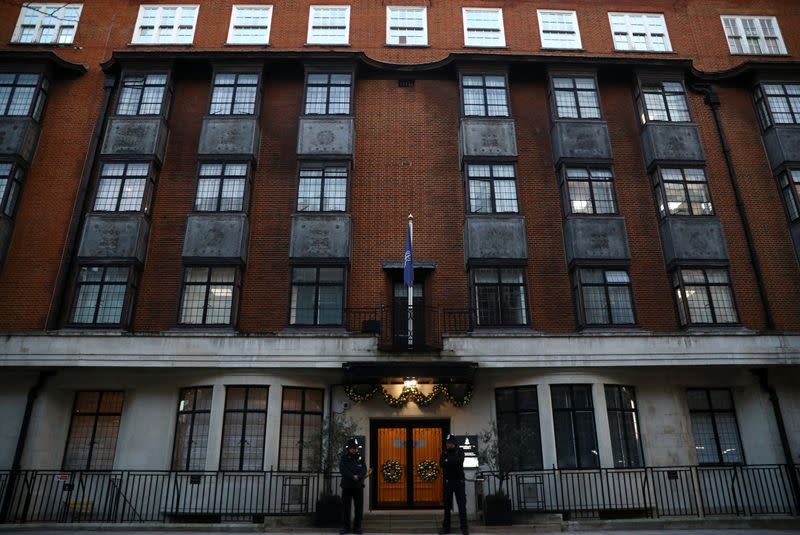 Police officers stand outside King Edward VII's Hospital, where Britain's Prince Philip was admitted, in London