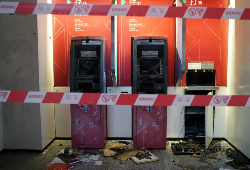 Bank ATMs which were vandalised during Sunday's anti-government protest are seen at Nathan Street in Hong Kong