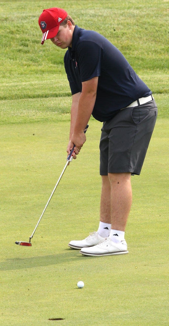 BNL junior Jett Jones tries to bend in a putt Saturday in the HHC Match at Otis Park.