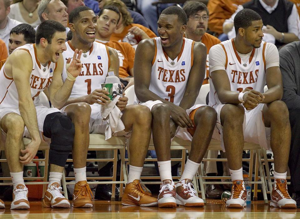 Jordan Hamilton, second from right, shares a light moment on the bench with, from left, Dogus Balbay, Gary Johnson and Tristan Thompson late in a 2011 Texas win at Oklahoma. Twelve years later, Hamilton has reunited with fellow former Longhorns to play once again.