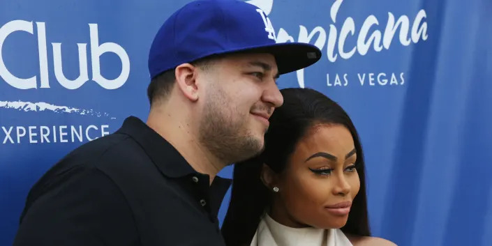 Rob Kardashian and Blac Chyna pose for a photo.