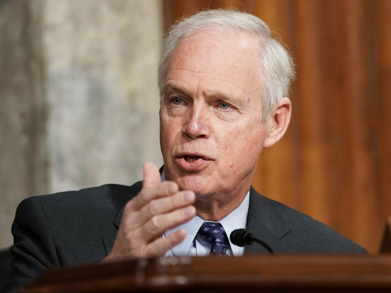 <p>Ron Johnson (R-WI) asks questions during a Senate Homeland Security and Governmental Affairs & Senate Rules and Administration joint hearing to discuss the January 6th attack on the U.S. Capitol on 3 March 2021 in Washington, DC</p> ((Getty Images))