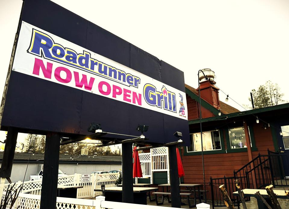 A temporary sign announces the arrival of the second location of The Roadrunner Grill at 3256 Cascade Boulevard in Shasta Lake. The grill opened in December in the A-frame building that formerly housed a barbecue restaurant. The original location remains in Cottonwood.