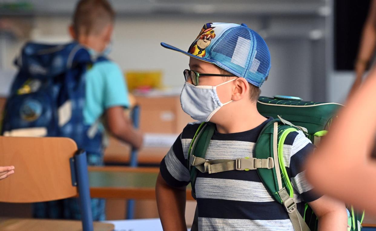 Un enfant masqué à l'école en Allemagne (photo d'illustration).

 - Ina FASSBENDER / AFP