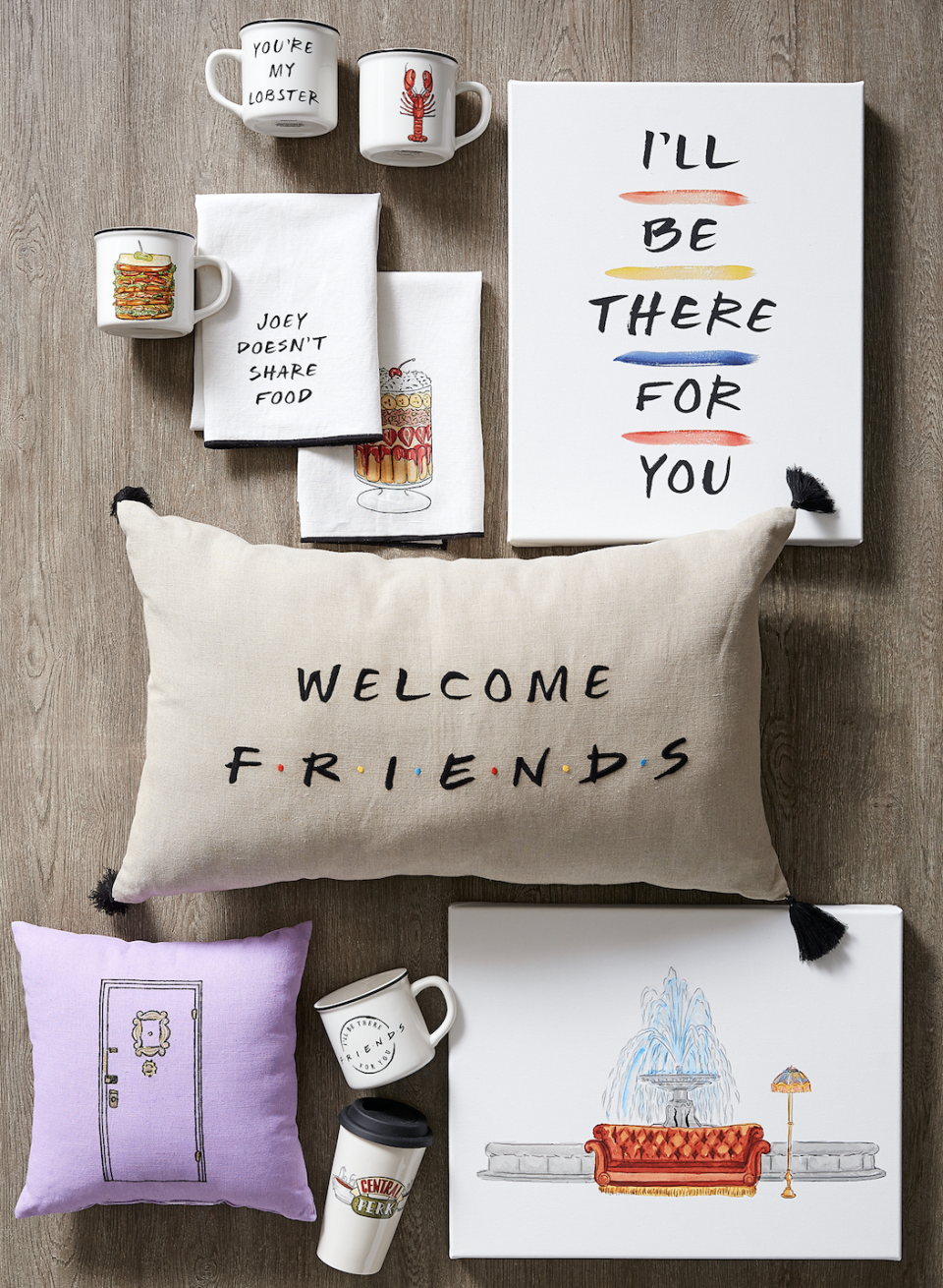 Mugs, wall art and decorative pillows are part of the Pottery Barn collection.