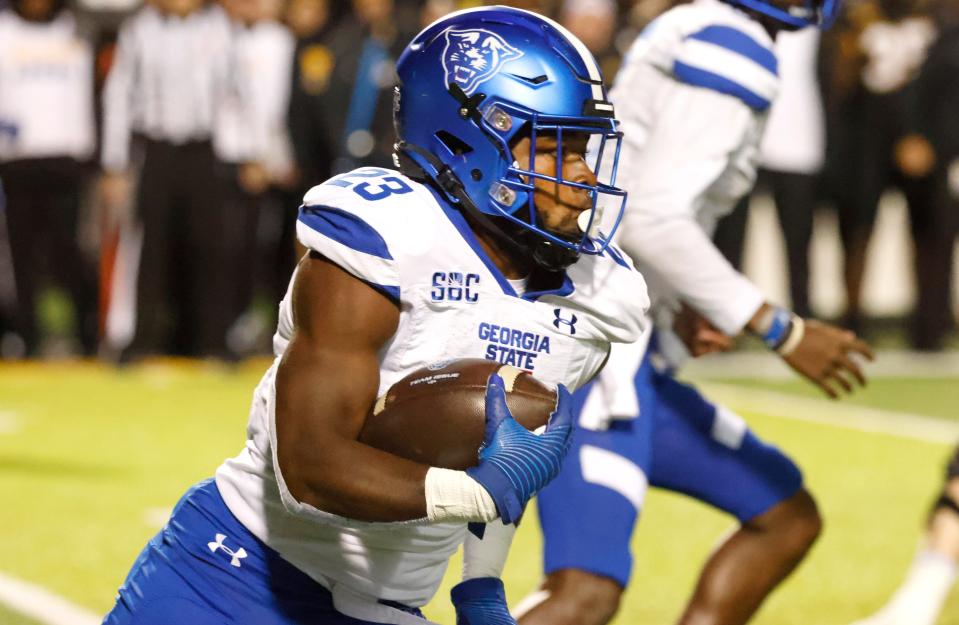 Oct 19, 2022; Boone, North Carolina, USA;  Georgia State Panthers running back Marcus Carroll (23) runs the ball during the second quarter against the Appalachian State Mountaineers at Kidd Brewer Stadium. Mandatory Credit: Reinhold Matay-USA TODAY Sports