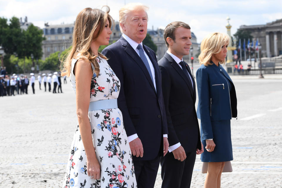 <p>French President Emmanuel Macron (R) and his wife Brigitte Macron (2nd R) stand with President Donald Trump and First Lady Melania Trump after the traditional Bastille Day military parade on the Champs-Elysees avenue in Paris, France, July 14, 2017. (Photo: Christophe Archambault/Pool/Reuters) </p>