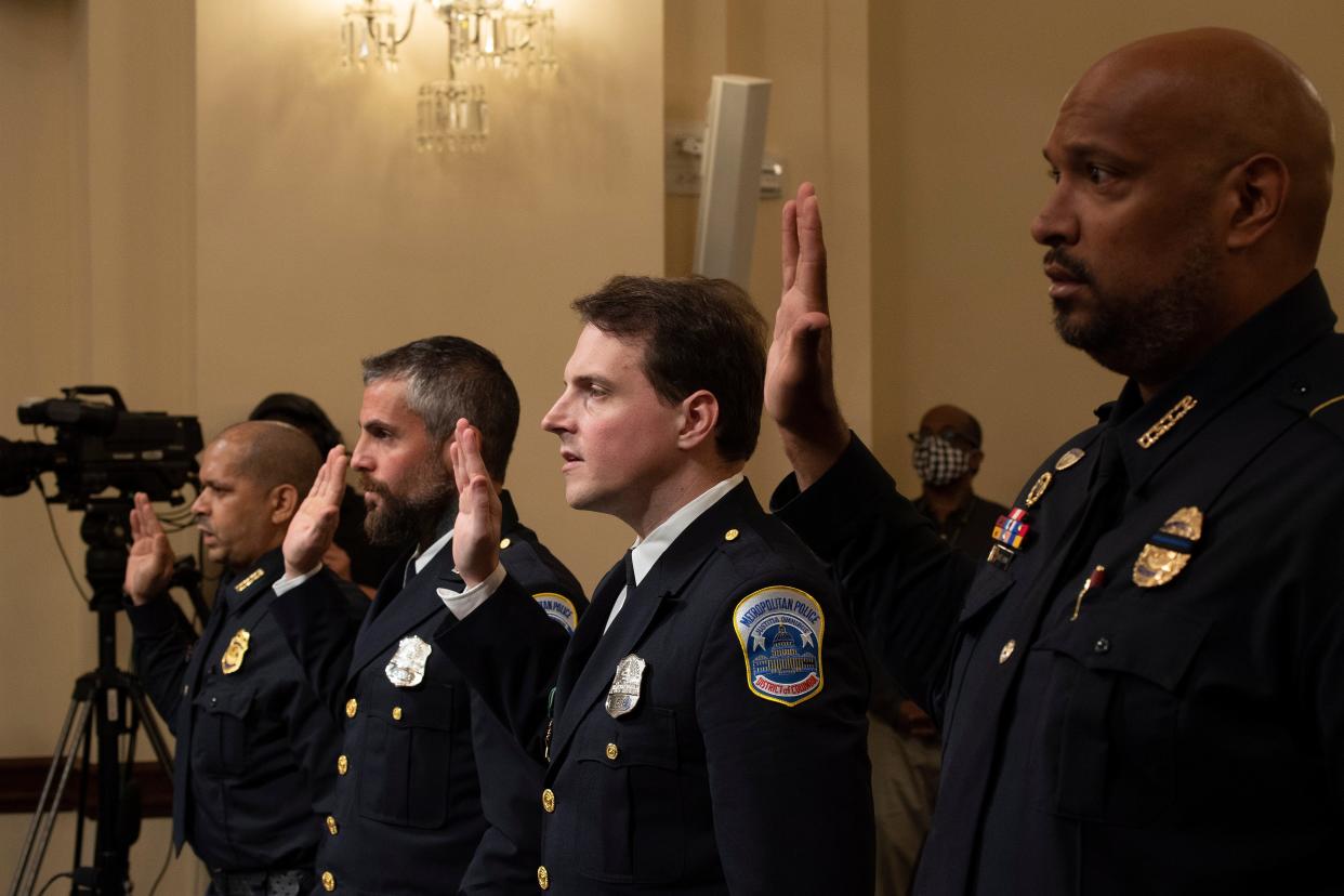 Four officers with the US Capitol Police are sworn in at Tuesday’s hearing on the 6 January attack. (EPA)