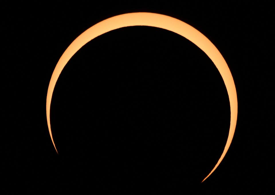 TOPSHOT – The Moon crosses in front of the Sun over Albuquerque, New Mexico, during an annular eclipse on October 14, 2023. (Photo by Patrick T. Fallon / AFP) (Photo by PATRICK T. FALLON/AFP via Getty Images)