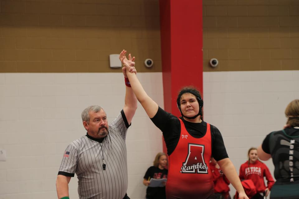 Attica sophomore Aubrey Bartkowiak gets her hand raised at Clinton Prairie High School on Saturday, Nov. 18, 2023.