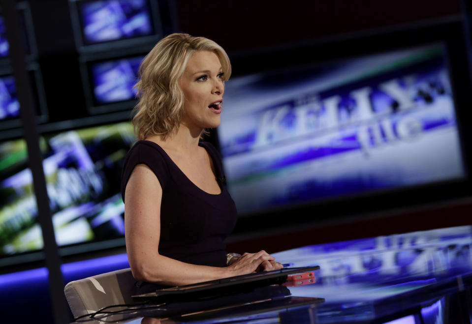 Megyn Kelly, host of Fox News Channel's "The Kelly Files," rehearses for the debut of her new show, in New York, Friday, Oct. 4, 2013. Her program is the linchpin to the first overhaul of Fox's prime-time lineup since 2002, or about a century in television time. (AP Photo/Richard Drew)