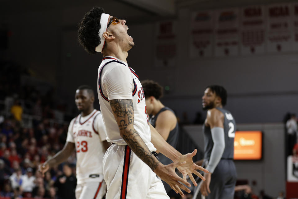 St. John's guard Andre Curbelo reacts after missing a shot against Xavier during the second half of an NCAA college basketball game Wednesday, Dec. 28, 2022, in New York. Xavier won 84-79. (AP Photo/Adam Hunger)