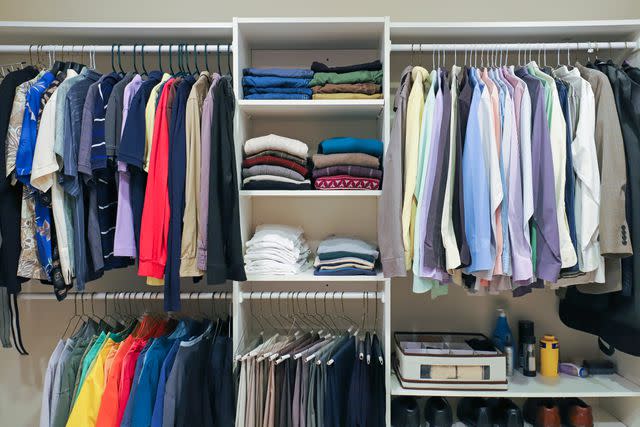 <p>Getty</p> Clothes in a closet