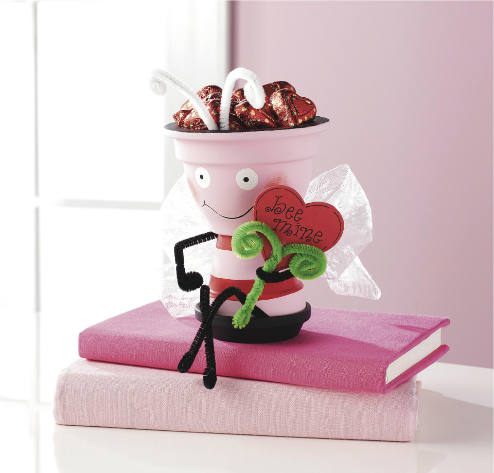 This undated publicity photo provided by SPM Communications shows a Clay Pot Valentine Love Bee from Michaels. Popular homemade gifts include candles and bath salts, personalized photo frames, artsy fashion scarves, and candy containers that say you're extra sweet. "That's the beauty of homemade gifts - they can be inexpensive, yet they show you care enough to put a lot of thought, creativity and effort into the gift," says Jo Pearson, a creative expert with Michaels stores, a national arts and crafts store. (AP Photo/SPM Communications, Michaels)