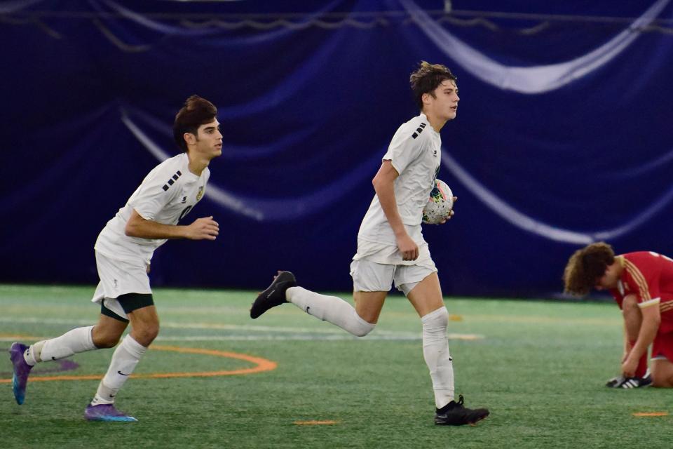 Giacomo Zizza, #14 of Morris Knolls heads back to midfield following his goal against Mount Olive in the second half during the NJAC-National boys soccer match at Mount Olive High in Flanders on 10/25/22.