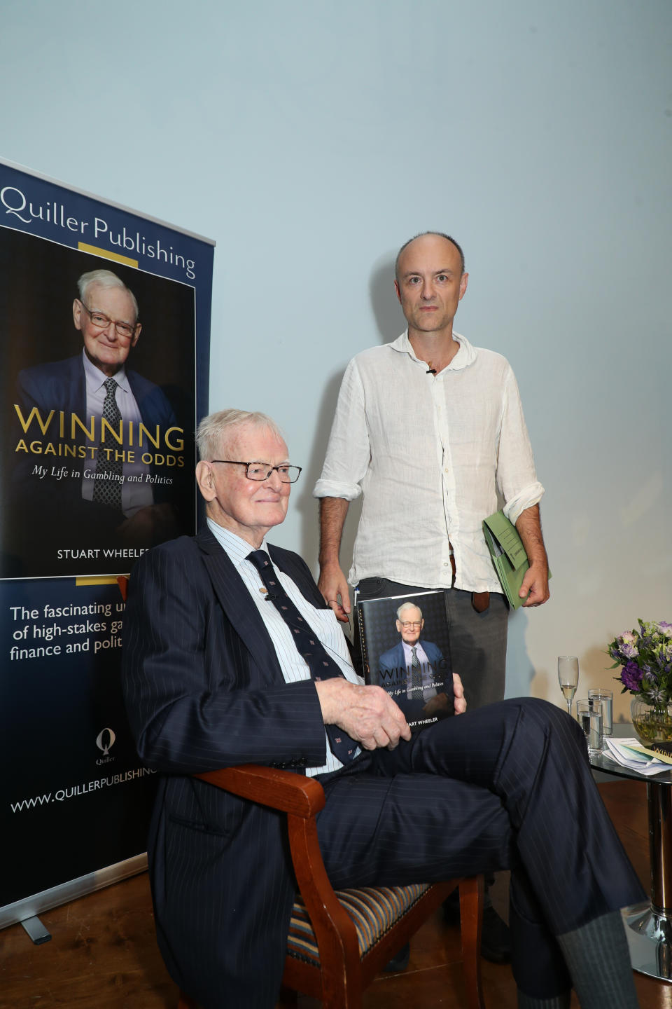 Stuart Wheeler (left) with Dominic Cummings at the book launch of Winning Against the Odds: My Life in Gambling and Politics by Stuart Wheeler at Carlton House Terrace, London.