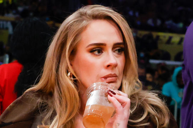 Adele Wears a Louis Vuitton Coat to Lakers' Season Opener