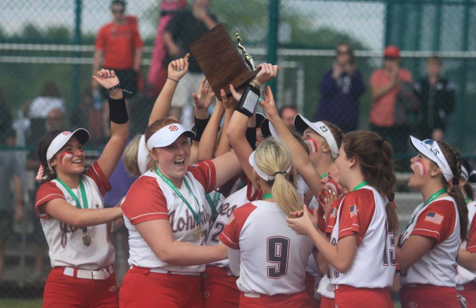 Johnstown players celebrate a 1-0 victory against East Knox in a Division III district final Saturday at Pickerington Central.