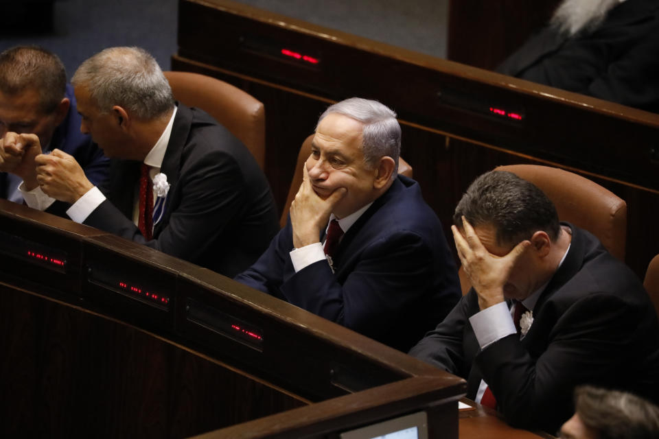 Israeli Prime Minister Benjamin Netanyahu attends the swearing-in of the new Israel's parliament in Jerusalem, Thursday., Oct. 3, 2019. (AP Photo/Ariel Schalit)