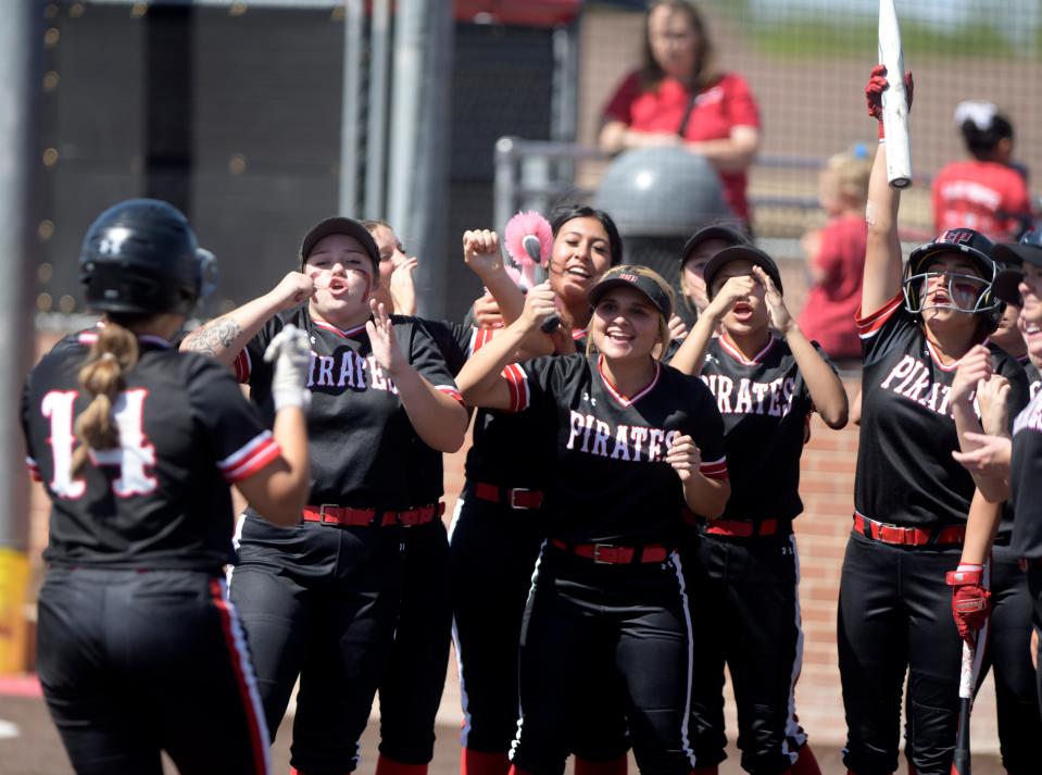 Lubbock-Cooper's softball team gestures after Lubbock-Cooper's Lydia Pesterfield's home run against Plainview in Game 2 of a Class 5A bi-district softball series, Saturday, April 27, 2024, at Lady Bulldog Park in Plainview.