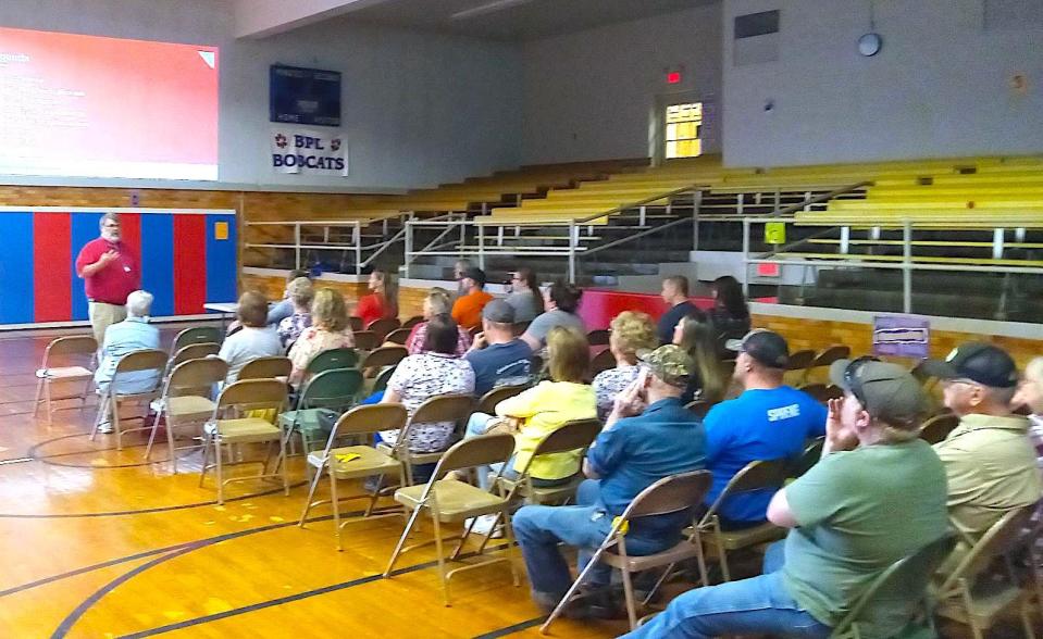West Holmes Superintendent Eric Jurkovic addresses a crowd of around 35 people during an informational meeting about the state of the facilities in the West Holmes District.