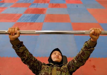 Female soldier, Parwana Naji, 19, from the Afghan National Army (ANA) at the gym at the Kabul Military Training Centre (KMTC) in Kabul, Afghanistan, October 23, 2016. REUTERS/Mohammad Ismail