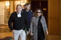 Federal Reserve Bank of New York Vice President Simon Potter (L), Carmen Reinhart, Harvard University Professor of the International Financial System (R) and her husband Vincent attend the Federal Reserve Bank of Kansas City's annual Jackson Hole Economic Policy Symposium in Jackson Hole, Wyoming August 28, 2015. REUTERS/Jonathan Crosby