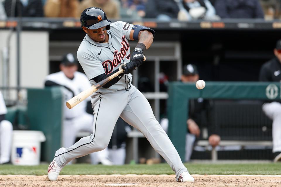 Detroit Tigers second baseman Andy Ibanez hits an RBI-single against the Chicago White Sox during the ninth inning at Guaranteed Rate Field in Chicago, Illinois on Sunday, March 31, 2024.