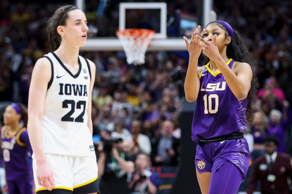 LSU's Angel Reese, right, taunted Iowa's Caitlin Clark after the Tigers won the NCAA women's national title on Sunday and was roundly criticized for a hand gesture Clark had used herself to taunt Louisville earlier in the tournament.