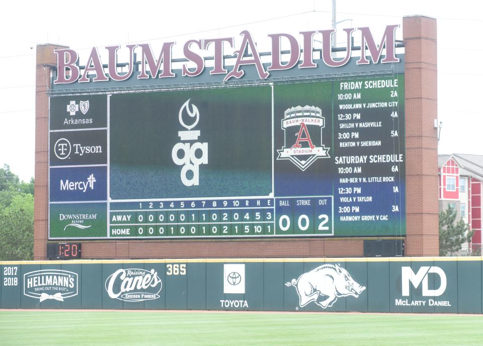 The Baum-Walker Stadium scoreboard shows the original schedule for finals weekend.<br>Dsc 7996