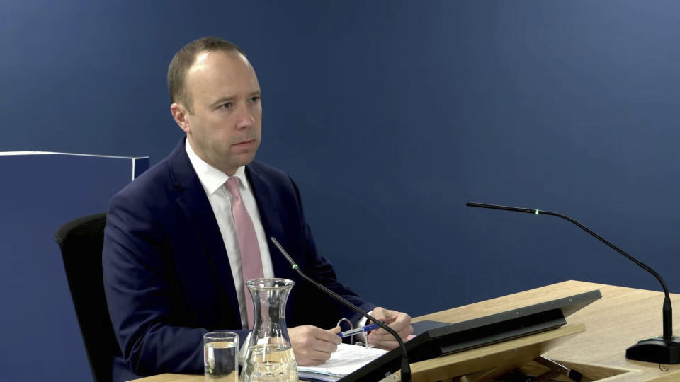 This grab taken from the UK COVID-19 Inquiry Live Stream shows former health secretary Matt Hancock giving evidence at Dorland House during its second investigation (Module 2) exploring core UK decision-making and political governance, in London, Thursday, Nov. 30, 2023. (UK Covid-19 Inquiry/PA via AP)