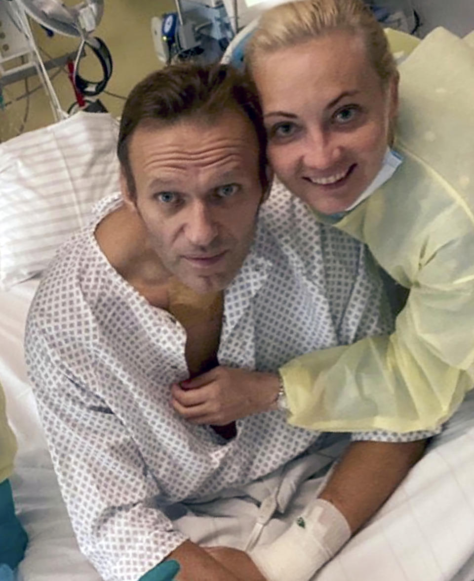 This handout photo published by Russian opposition leader Alexei Navalny on his instagram account, shows himself and his wife Yulia, posing for a photo in a hospital in Berlin, Germany. Russian opposition leader Alexei Navalny has posted the picture of himself in a hospital in Germany and says he's breathing on his own. He posted on Instagram Tuesday Sept. 15, 2020: "Hi, this is Navalny. I have been missing you. I still can't do much, but yesterday I managed to breathe on my own for the entire day." (Navalny instagram via AP)