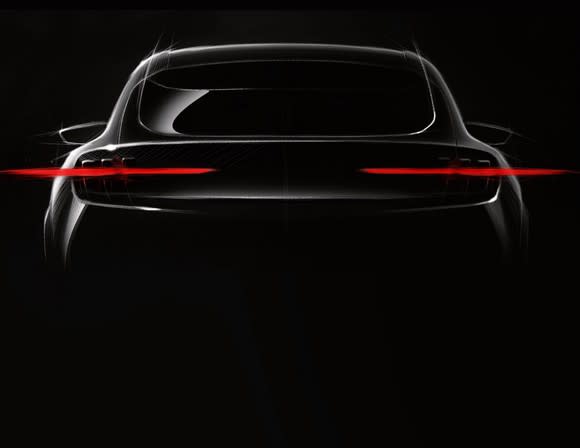 The rear of a sporty SUV is shown in shadow. We can see &quot;3 finger&quot; taillights inspired by classic Ford Mustangs.