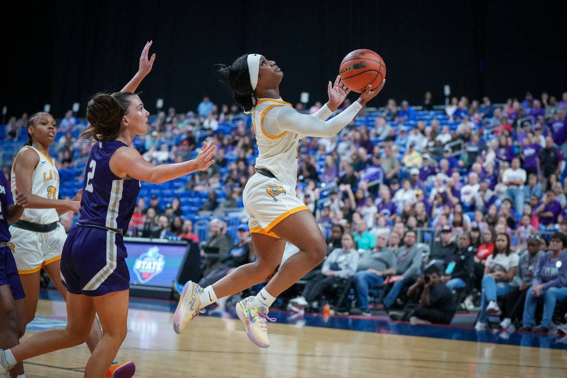 Waco La Vega’s Kiyleyah Parr, the Championship Game MVP, goes up for two in front of Canyon’s Brooklyn Kinsey in the Class 4A state championship game on Saturday, March 2, 2024 at the Alamodome in San Antonio, Texas. La Vega held off Canyon 45-36.