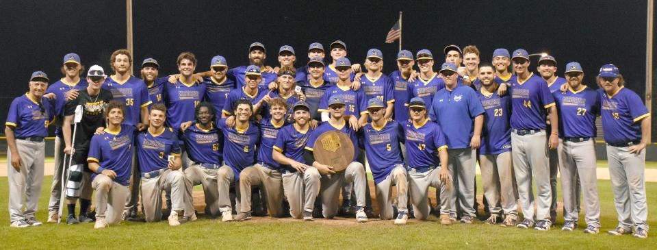 Niagara County Community College's Thunderwolves pose with NJCAA Region III Division III's baseball championship plaque after beating Herkimer College at Veterans Memorial Park in Saturday's title game.