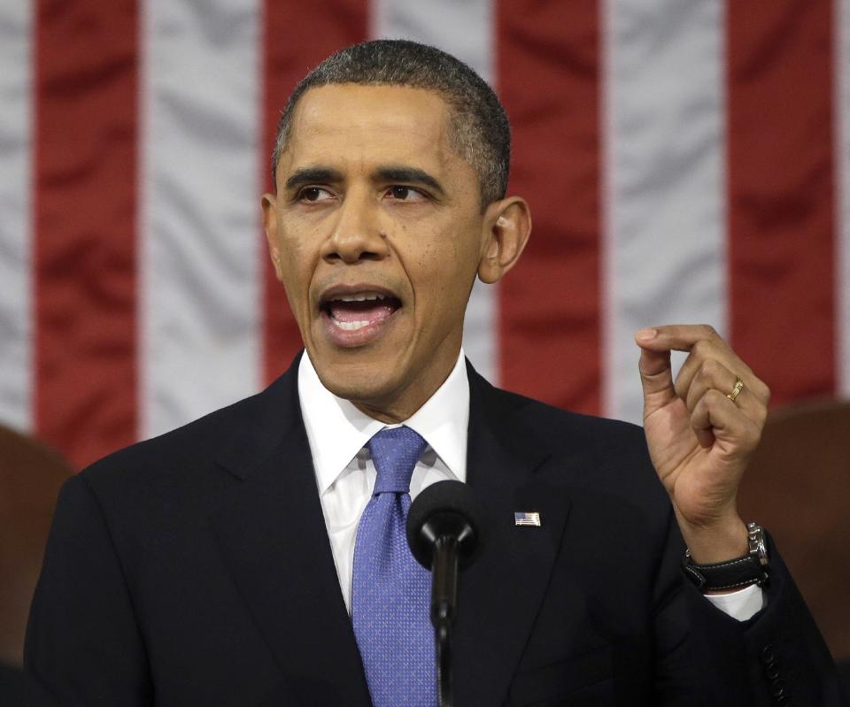 FILE - In this Feb. 12, 2013, file photo, President Barack Obama gives his State of the Union address during a joint session of Congress on Capitol Hill in Washington. Obama reports to Congress and the nation Jan. 28, 2014, on the State of the Union, an annual rite in official Washington that for one night squeezes the three branches of government underneath the same roof for the speech. (AP Photo/Charles Dharapak, Pool)