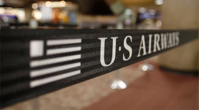 US Airways has rushed out an apology after a graphic sexual image was tweeted from its official Twitter account in response to a disgruntled customer. Photo: AFP.
