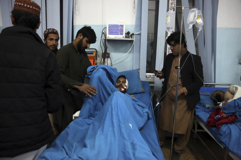 An injured man receives treatment at a hospital after a suicide bombing in Kabul, Afghanistan, Nov. 20, 2018. Afghan officials said the suicide bomber targeted a gathering of Muslim religious scholars in Kabul. (AP Photo/Rahmat Gul)