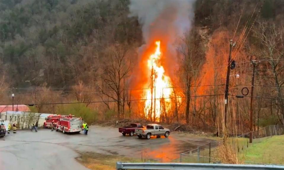 First responders on the scene of a train derailment at in Eastern Kentucky on Feb. 13, 2020. Two crew members of the CSX train were initially trapped, and a flammable liquid was leaking into a nearby river, said Charles Maynard with Pike County Emergency Management.